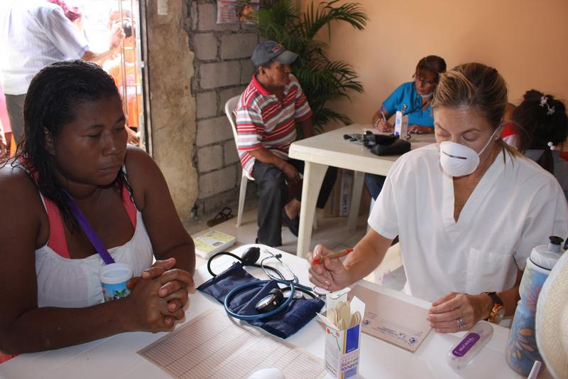 Annabella Azin provides medical care to the members of the Esmeraldas Chiquito community.