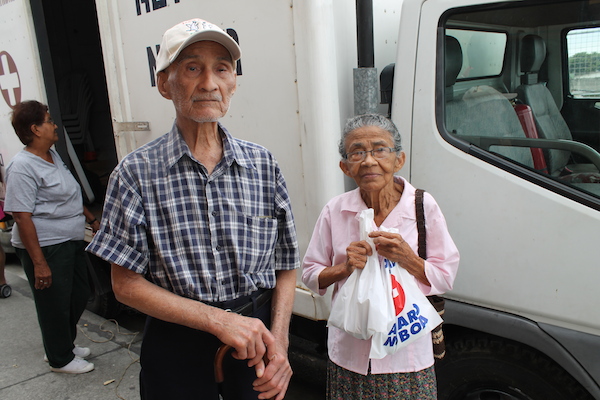 Older adults receive assistance from the New Humanity Crusade Foundation